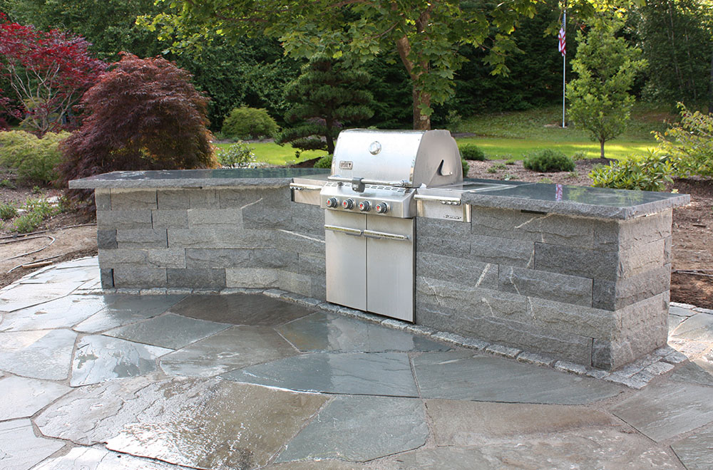A grill built into a granite wall